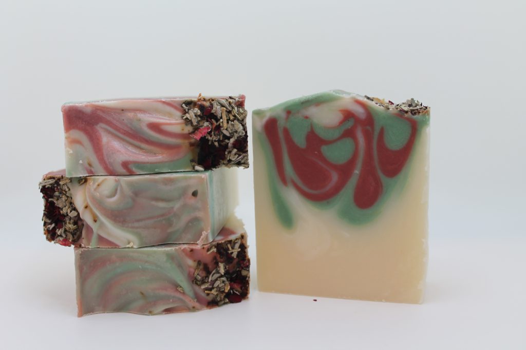 A close up of three bars of soap