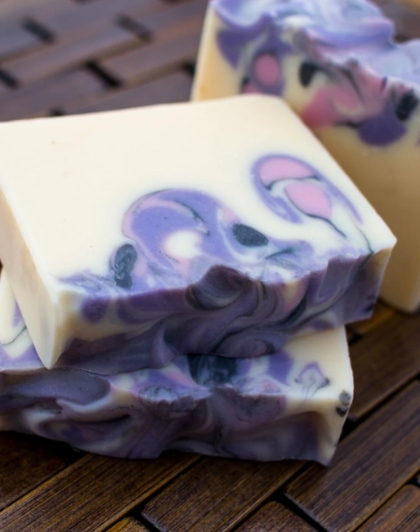 A close up of two bars of soap