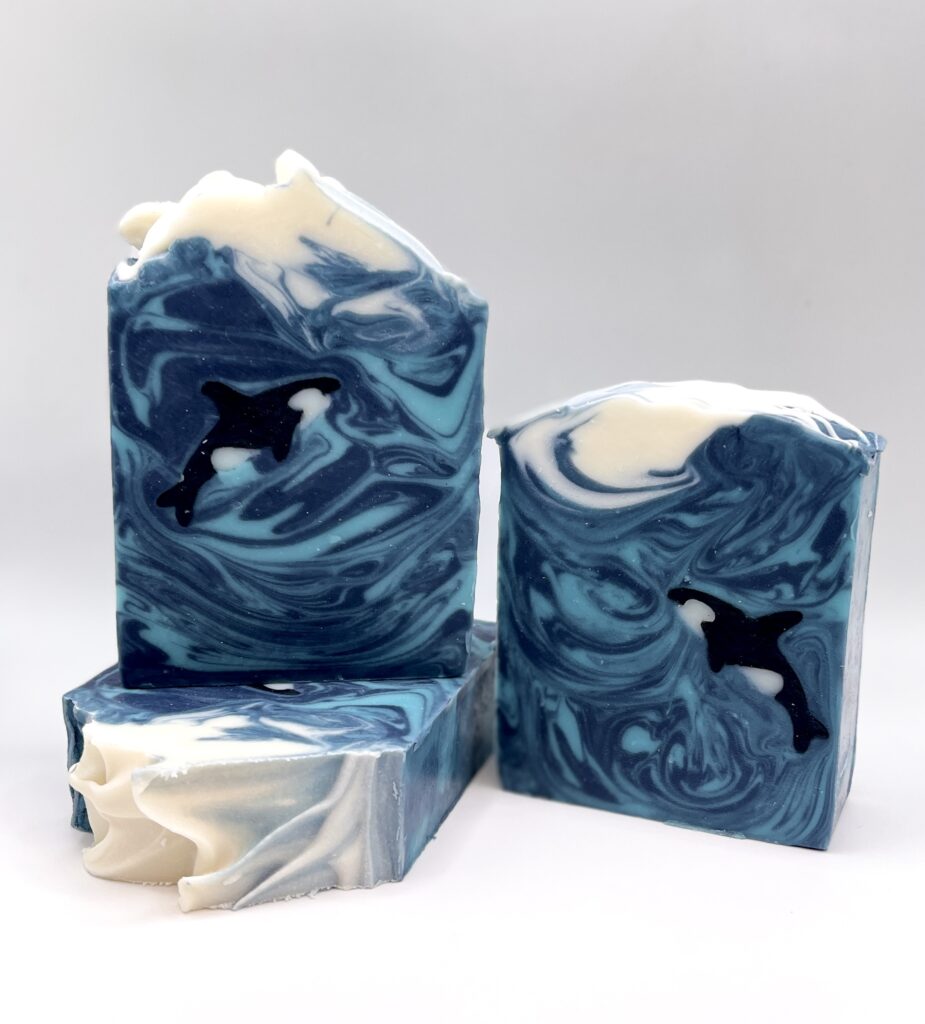 A group of three soaps sitting on top of each other.