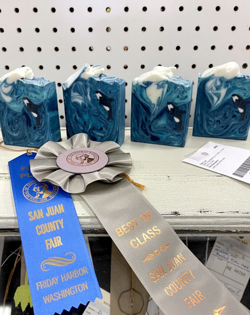 A table with blue marble paintings and ribbons