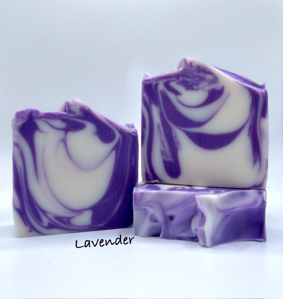 A close up of three bars of soap