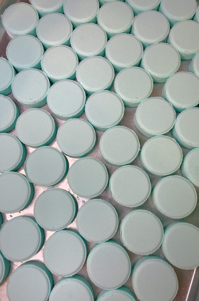 A close up of many round pills