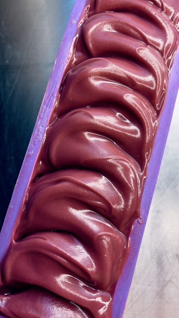 A close up of some chocolate covered bananas