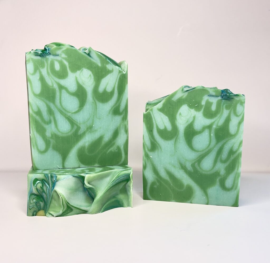 A green soap sitting on top of a counter.