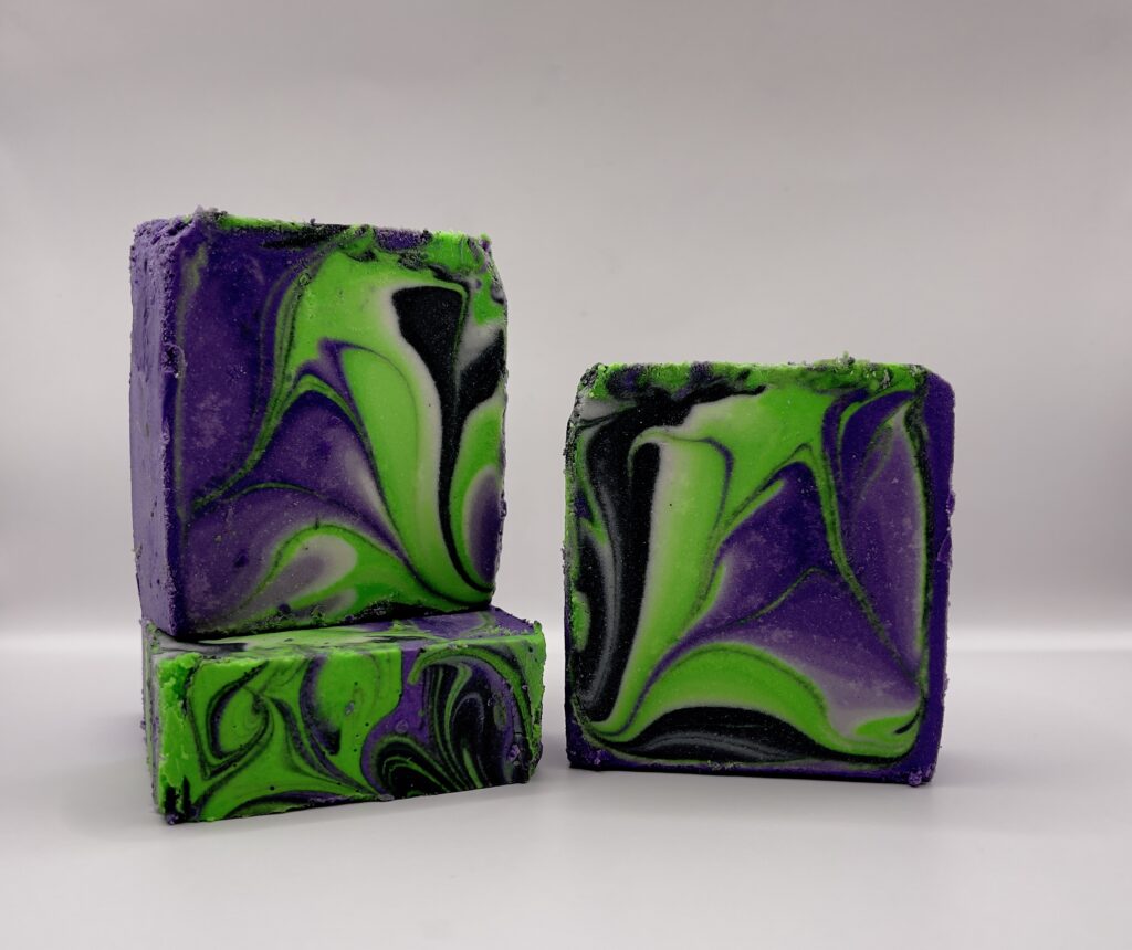 A group of three soap bars sitting on top of each other.