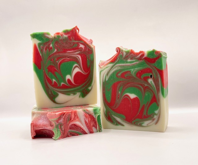 A close up of three soap bars on top of each other